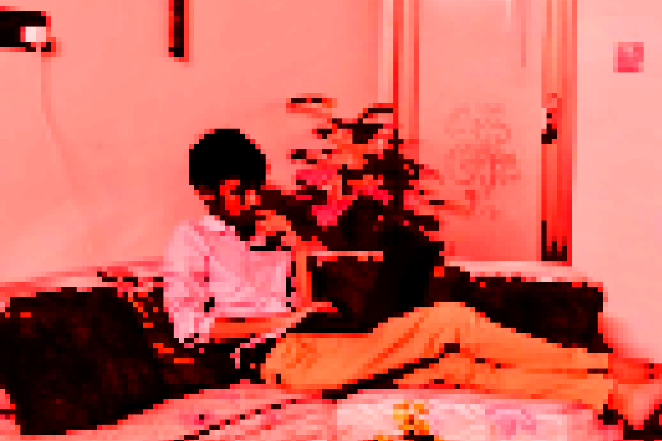 Person lying in a field of yellow flowers